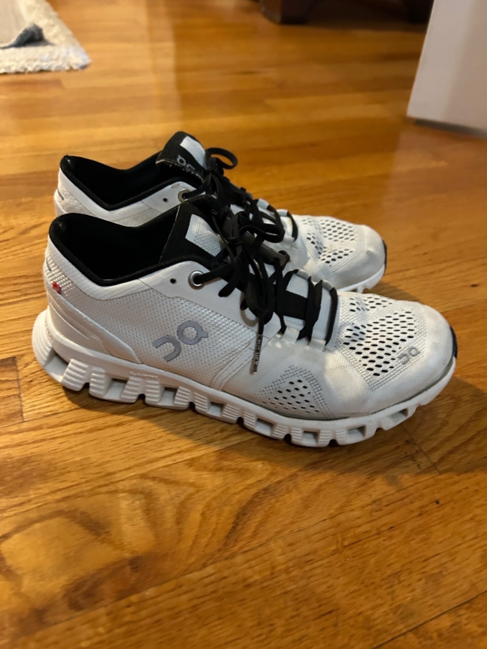 On Running White and Black Women's Athletic Shoes